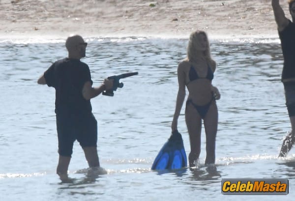 Hailey Baldwin Bieber poses during a photoshoot on the beach in Miami photo 36