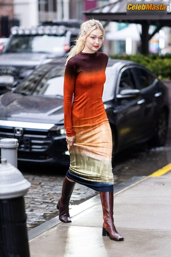 Gigi Hadid Returning to Her NoHo Home Wearing a Colorful Dress photo 12