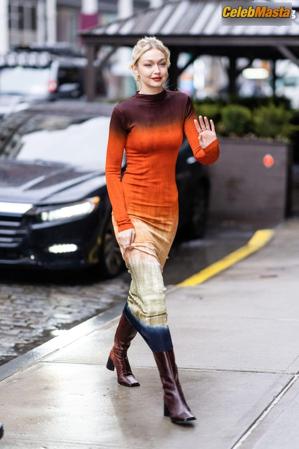 Gigi Hadid Returning to Her NoHo Home Wearing a Colorful Dress photo 15