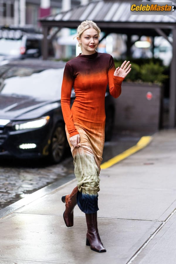 Gigi Hadid Returning to Her NoHo Home Wearing a Colorful Dress photo 16