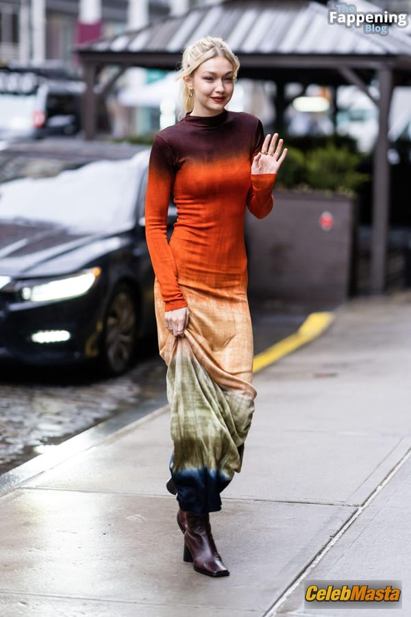 Gigi Hadid Returning to Her NoHo Home Wearing a Colorful Dress photo 17