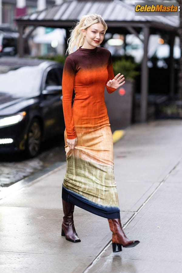 Gigi Hadid Returning to Her NoHo Home Wearing a Colorful Dress photo 18