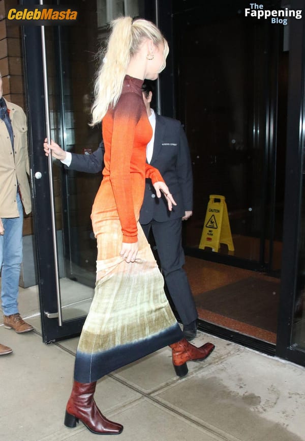 Gigi Hadid Returning to Her NoHo Home Wearing a Colorful Dress photo 45