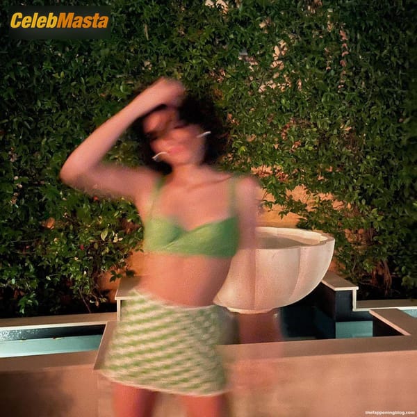 Dixie D’Amelio Scene Photos Gallery from Dixie Damelio Poses In A Green Top And A Skirt Showing Young Body In A New Social Media Photoshoot photo 5