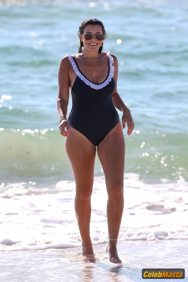 Imogen Thomas Photo Gallery: Shows Off Her Toned Body In A Blue Chasing Summer Swimsuit photo 1