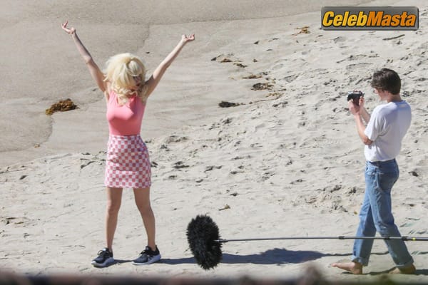 Emmy Rossum Gallery: Films Scenes as the Iconic Angelyne on the Beach in Malibu photo 5