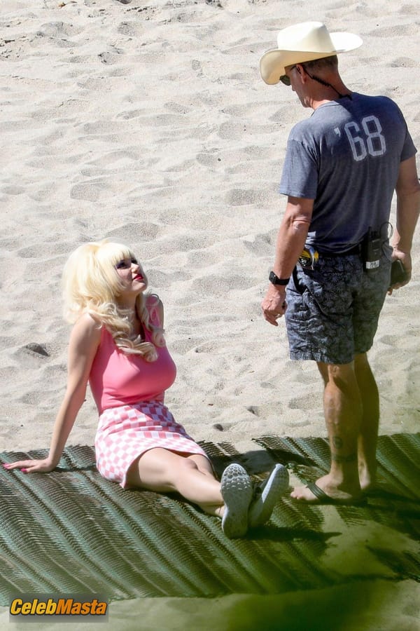 Emmy Rossum Gallery: Films Scenes as the Iconic Angelyne on the Beach in Malibu photo 13