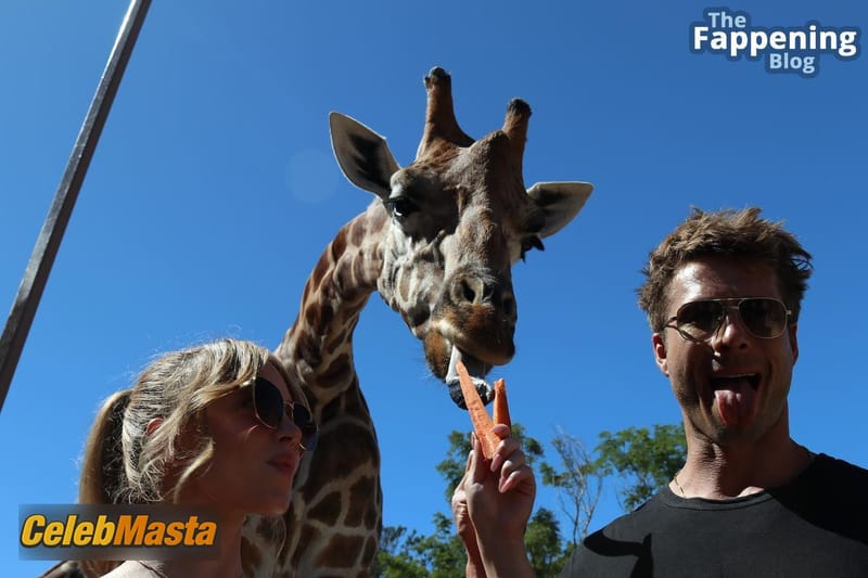 Sydney Sweeney Sexy Seen Examining Giraffes Long Tongue Photo Gallery photo 3