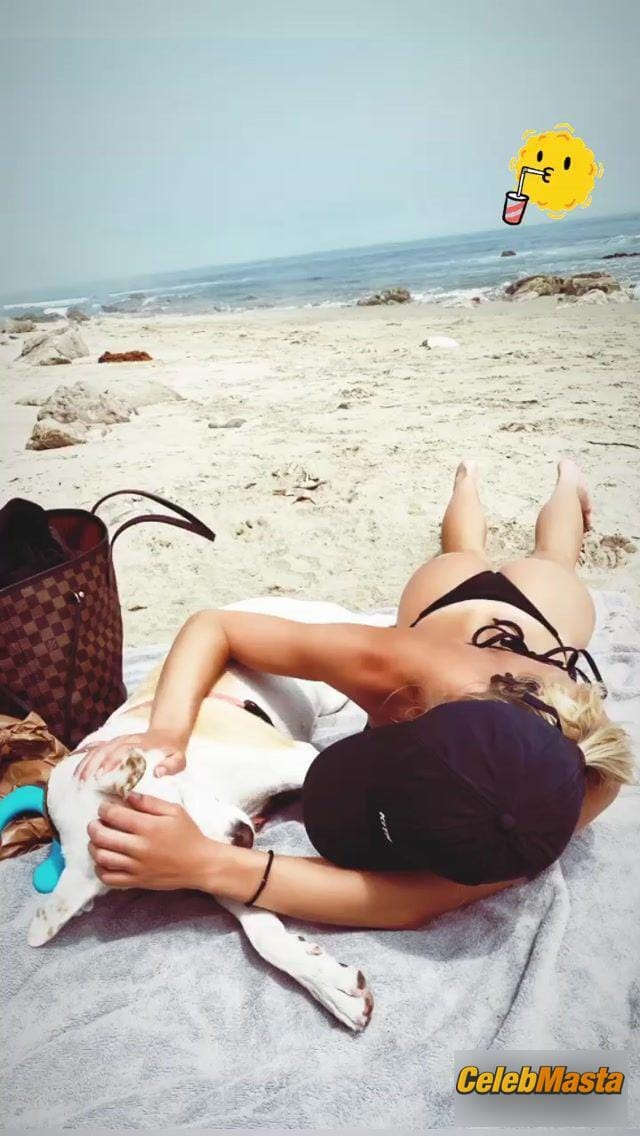 Sydney Sweeney flaunts her sexy body, big butt and boobs while enjoying a day with her dog on the beach Photo Gallery photo 2