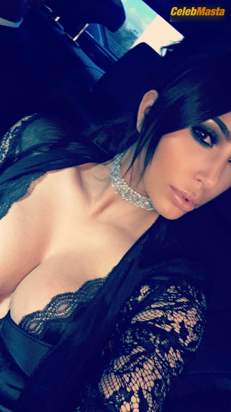 Kim Kardashian Cleavage in A Car Photo Gallery photo 1