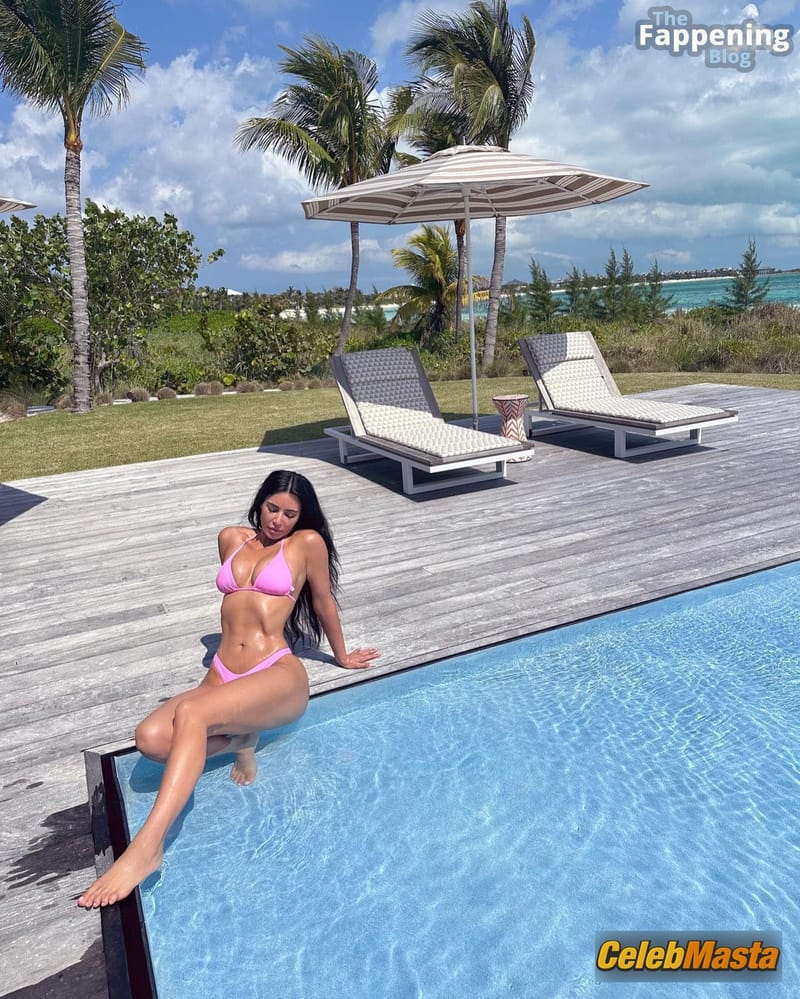 Kim Kardashian Flaunts Sexy Figure In Pink Bikini At Poolside Photo Gallery photo 3
