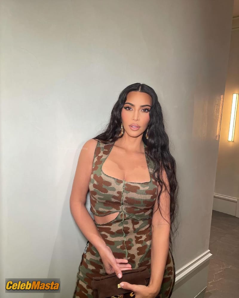 Kim Kardashian Sexy Poses In New Cosmetics Photoshoot Showing Nice Cleavage photo 2