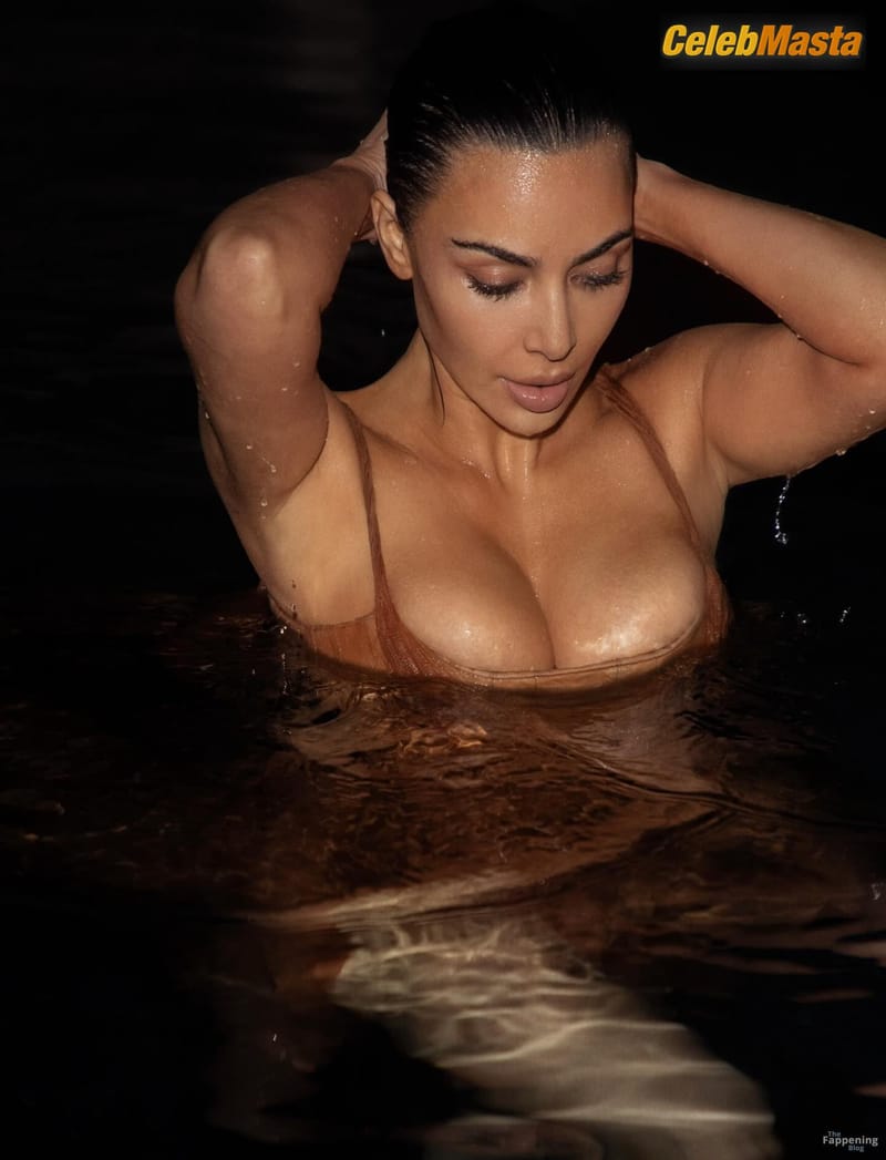 Kim Kardashian Sexy Poses Her Wet Boobs Wearing A Sensual Sheer Dress In A Beach Photoshoot photo 2