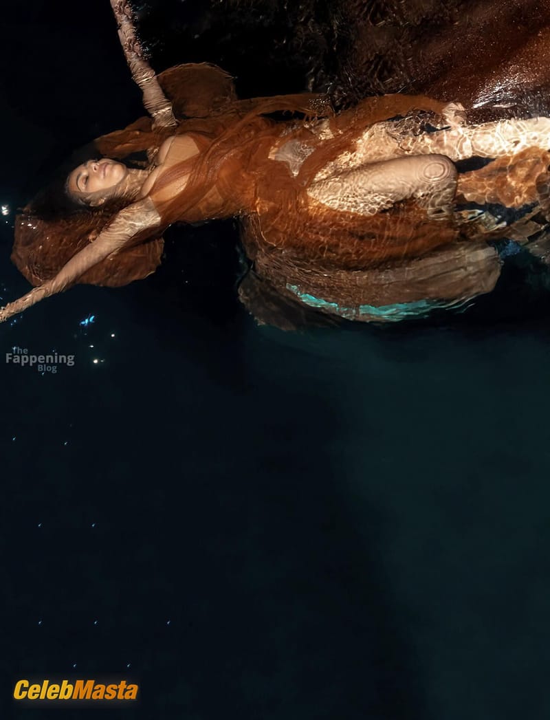 Kim Kardashian Sexy Poses Her Wet Boobs Wearing A Sensual Sheer Dress In A Beach Photoshoot photo 3
