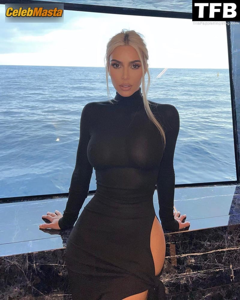 Kim Kardashian Sexy Seen Showing Off Her Hot Tits And Legs Wearing A See-through Black Dress In A Social Media Photoshoot photo 3