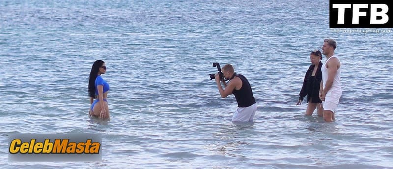 Kim Kardashian Sexy Seen Showing Off Her Sensational Curves On the Beach During A Photoshoot photo 3