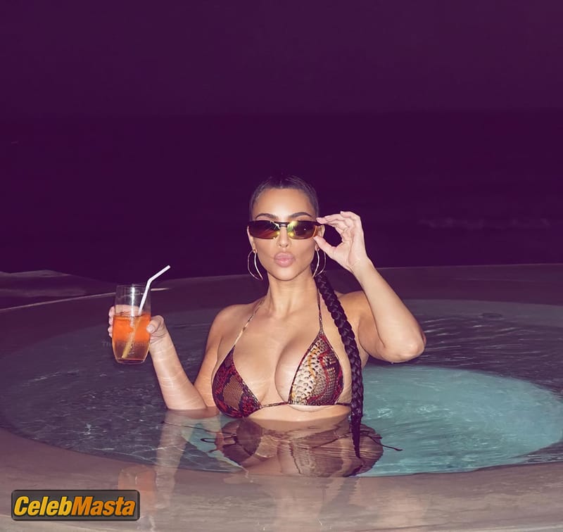 Kim Kardashian poses in a bikini in the pool before going to bed Photo Gallery photo 1