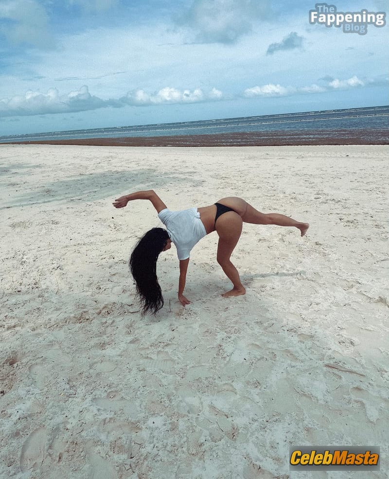 Kim Kardashian Sizzles In Sexy Beach Cartwheels Photo Gallery photo 3