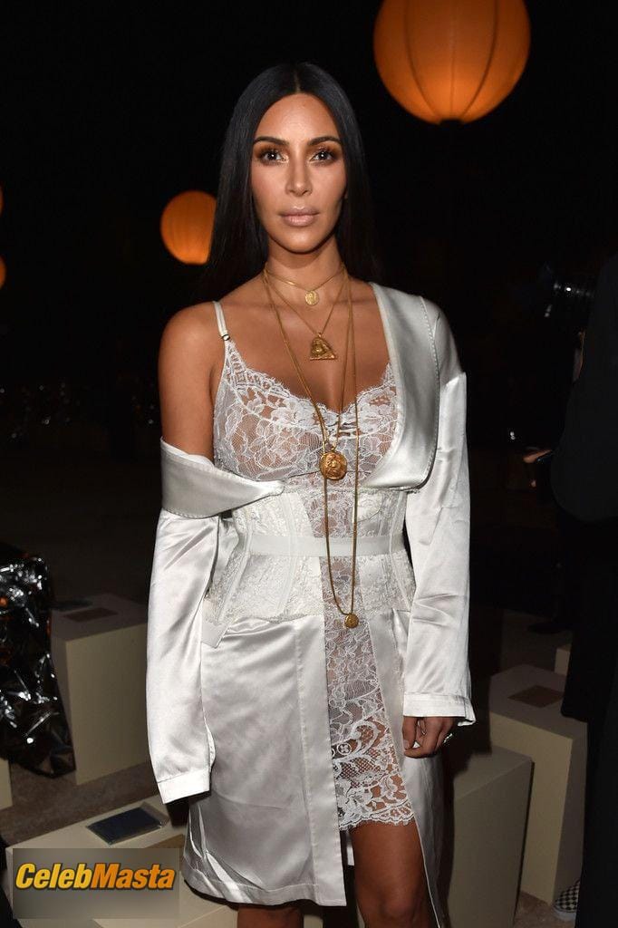 Kim Kardashian Wears White Lace Underwear at the Givenchy Show Photo Gallery photo 1