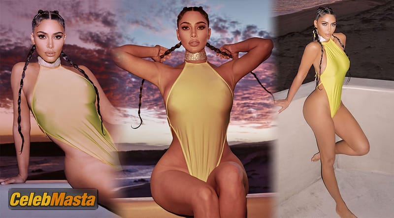 Kim Kardashian West shows off her boobs and wide hips posing in a revealing yellow swimsuit in a beautiful photoshoot by Greg Swales photo 1