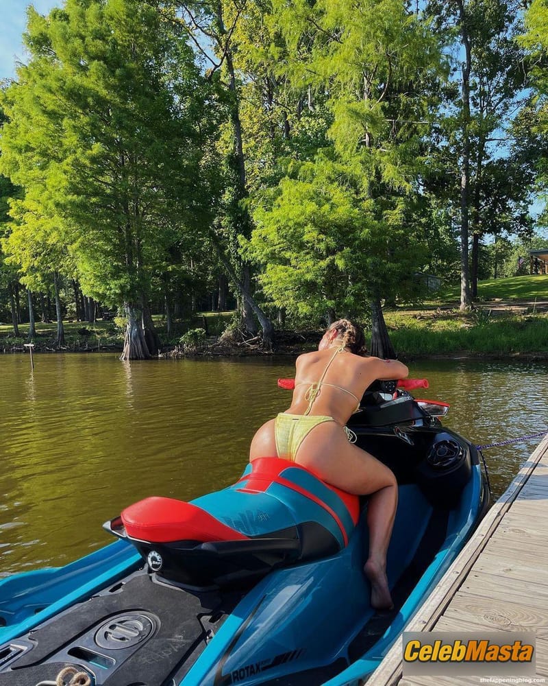 Addison Rae Sexy Shows Off Cleavage And Butt While Posing in A Yellow Bikini Photo Gallery photo 2