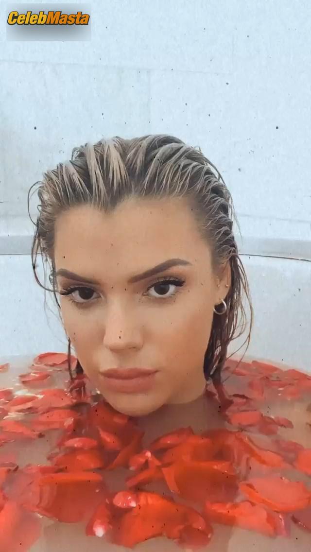 Alissa Violet in the bath with rose petals covering her breasts with her hands Photo Gallery photo 4