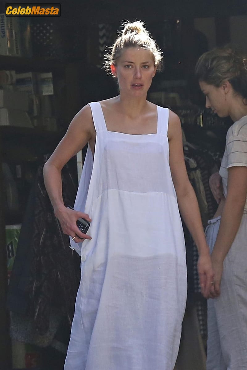 Amber Heard Nip Slip exposes Boob while cleaning out her garage in LA Photo Gallery photo 2