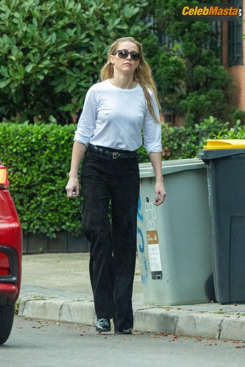 Amber Heard Flaunts Her Sexy Pokies In Madrid Photo Gallery photo 2