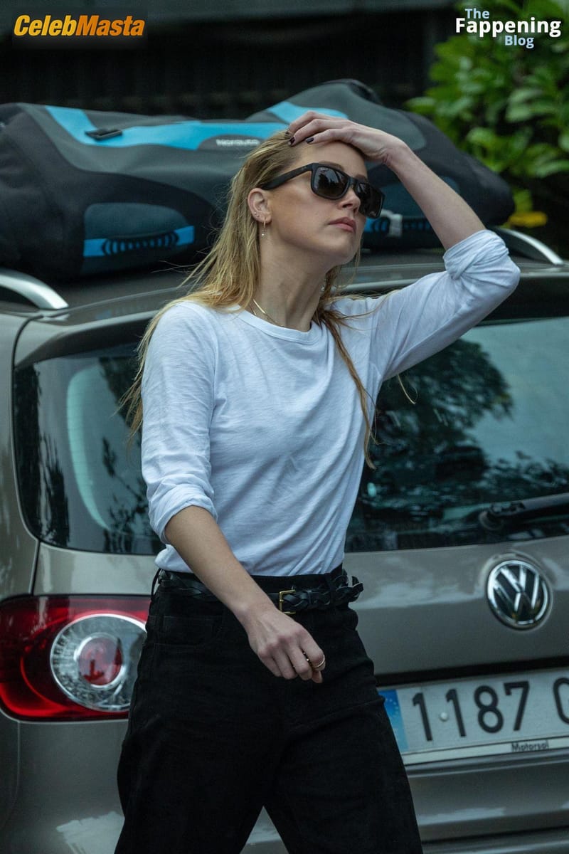 Amber Heard Flaunts Her Sexy Pokies In Madrid Photo Gallery photo 3