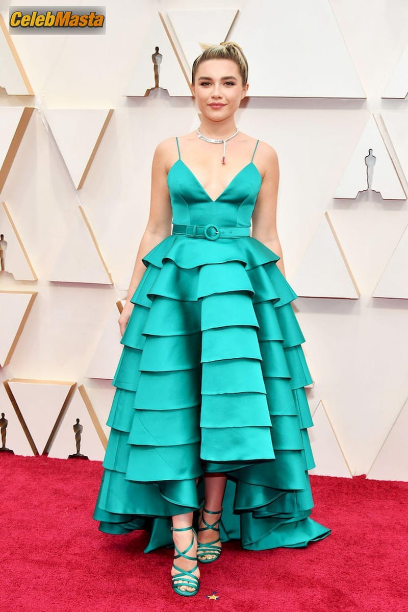 Florence Pugh poses on the red carpet wearing a turquoise dress during the Oscars arrivals at the 92nd Academy Awards in Hollywood Photo Gallery photo 4