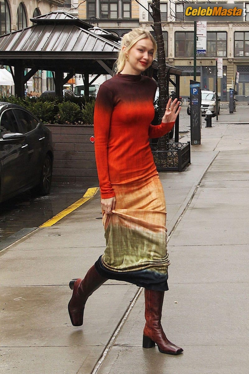 Gigi Hadid Returning to Her NoHo Home Wearing a Colorful Dress Photo Gallery photo 3