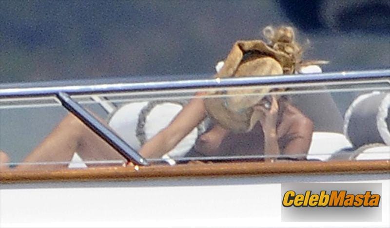 Elle MacPherson Pics: Topless Sunbathing On A Yacht photo 3