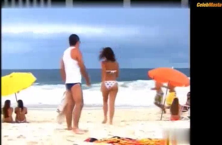 Camila Pitanga Bares Breasts in Paraiso Tropical Scene