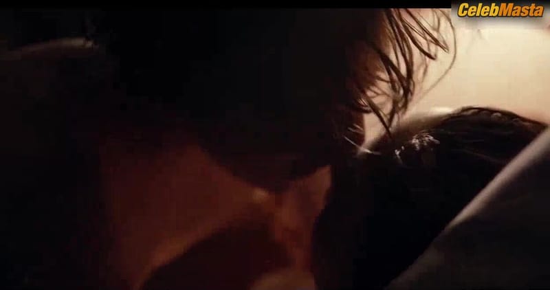 Lisa Vicari's Boobs Scene in Dark