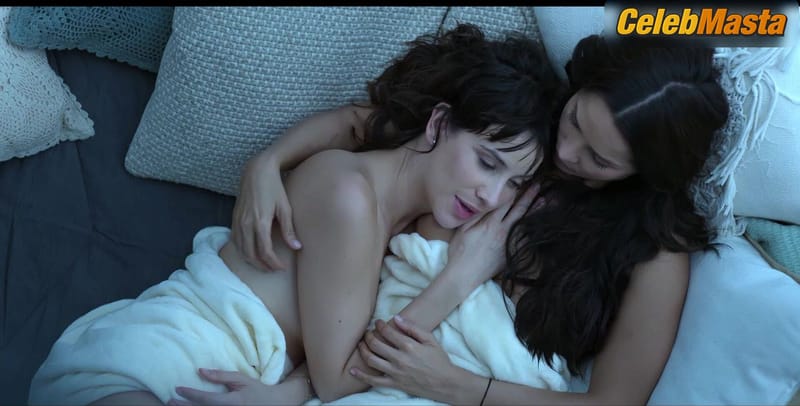 Laura Londono and Carmen Villalobos Bare Breasts in Lesbian Scene in The Guest