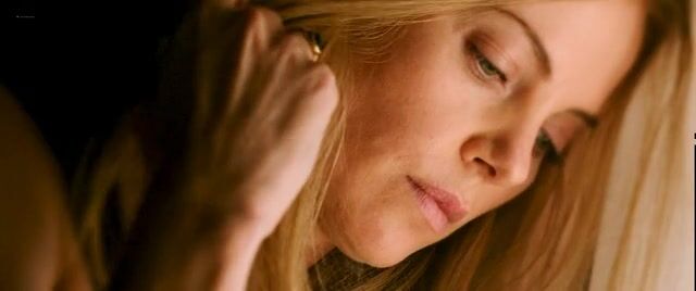 Charlize Theron ’s Romantic Scene In A Dark Room In - Photo 1 of 5 photo 5