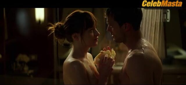 Dakota Johnson Flaunts Tits In Scene From Fifty Shades - Photo 1 of 5 photo 5