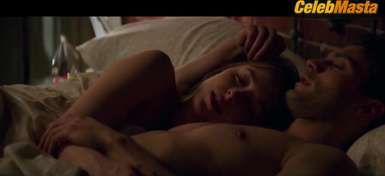 Dakota Johnson Shows Breasts In Scene From Fifty Shades - Photo 1 of 5 photo 2