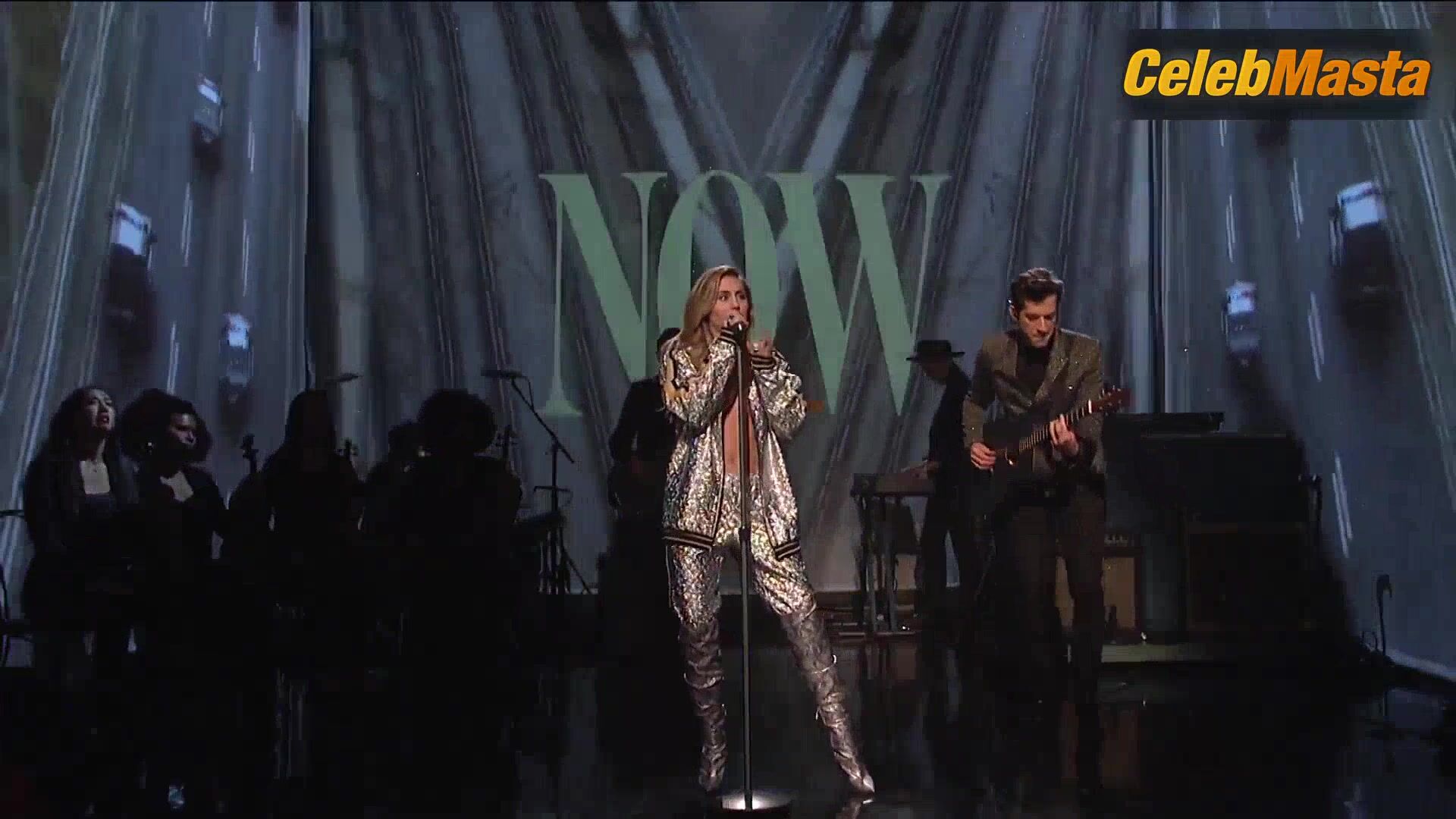 Miley Cyrus Shows A Racy Scene In Saturday Night Live - Photo 1 of 5 photo 2
