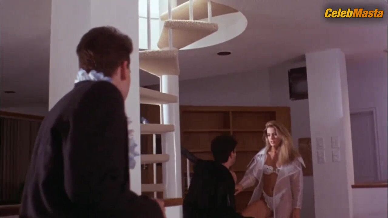 Nicole Eggert ’s Ass, Tits Scene From Blown Away - Photo 1 of 5
