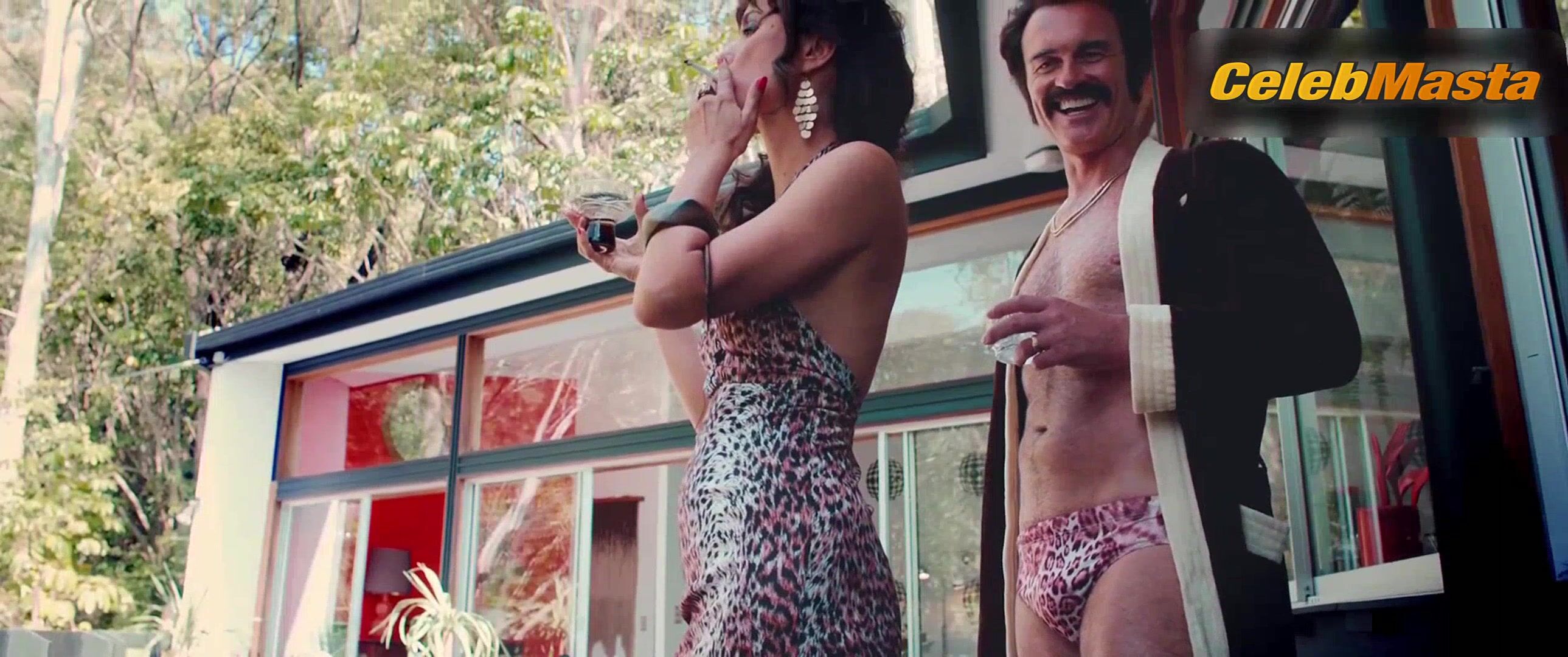 Radha Mitchell ’s Tits Scene From Swinging Safari - Photo 1 of 5