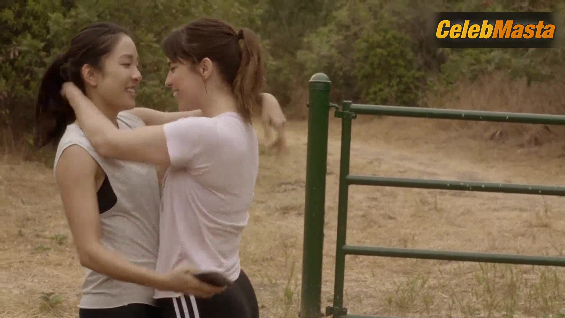 Angela Trimbur And Constance Wu’s Lesbian Sex Scene - Photo 1 of 5