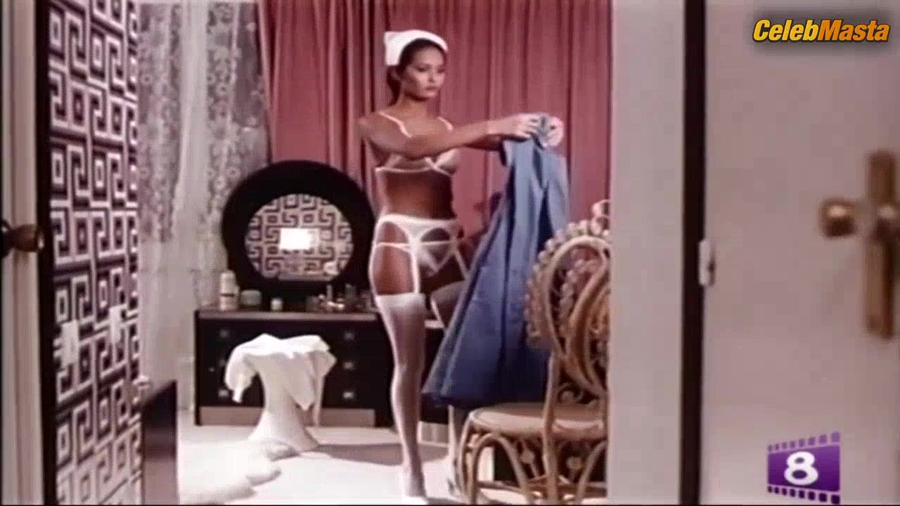 Laura Gemser Flaunts Lesbian Butt Scene In Malizia Erotica - Photo 2 of 5 photo 1