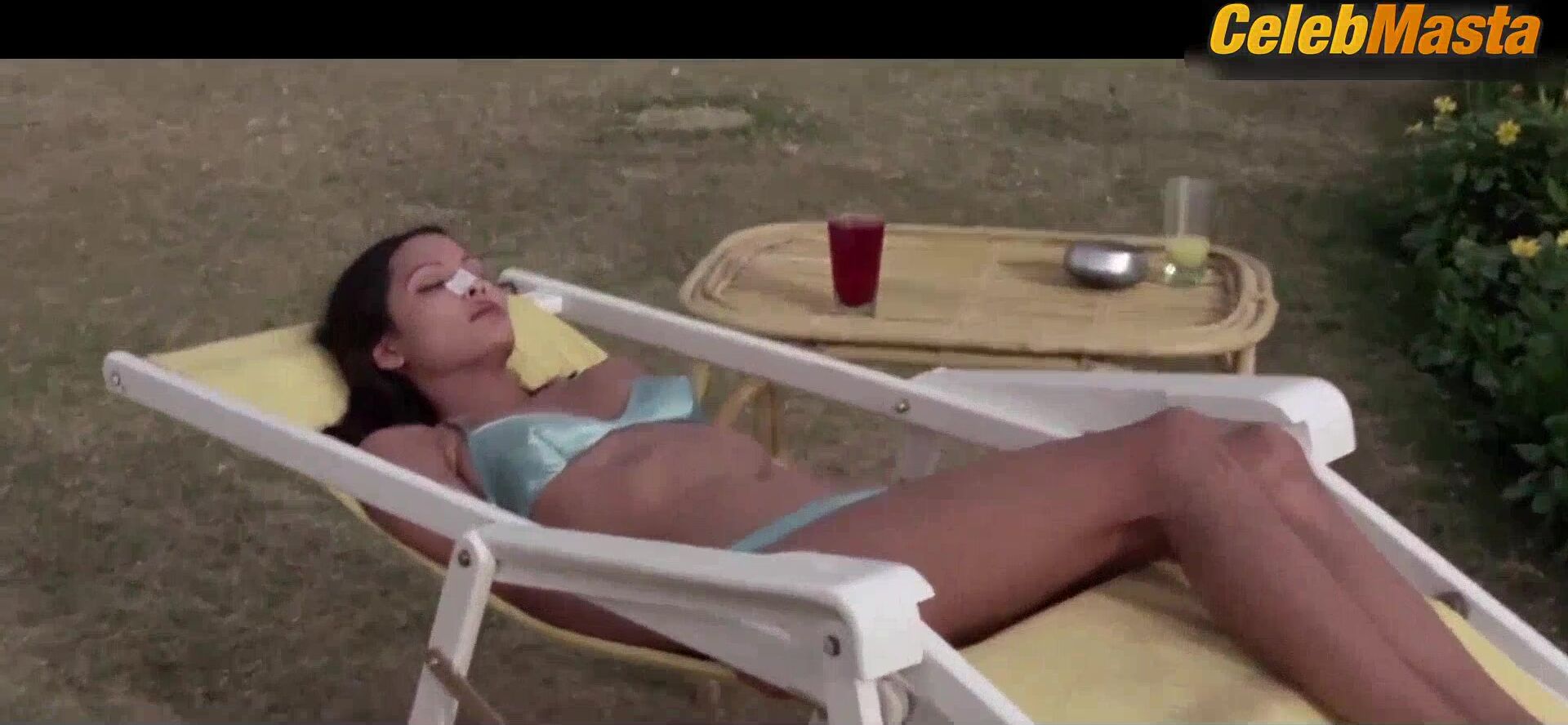 Laura Gemser ’s Tits, Swimsuit Scene In Black - Photo 2 of 5 photo 1