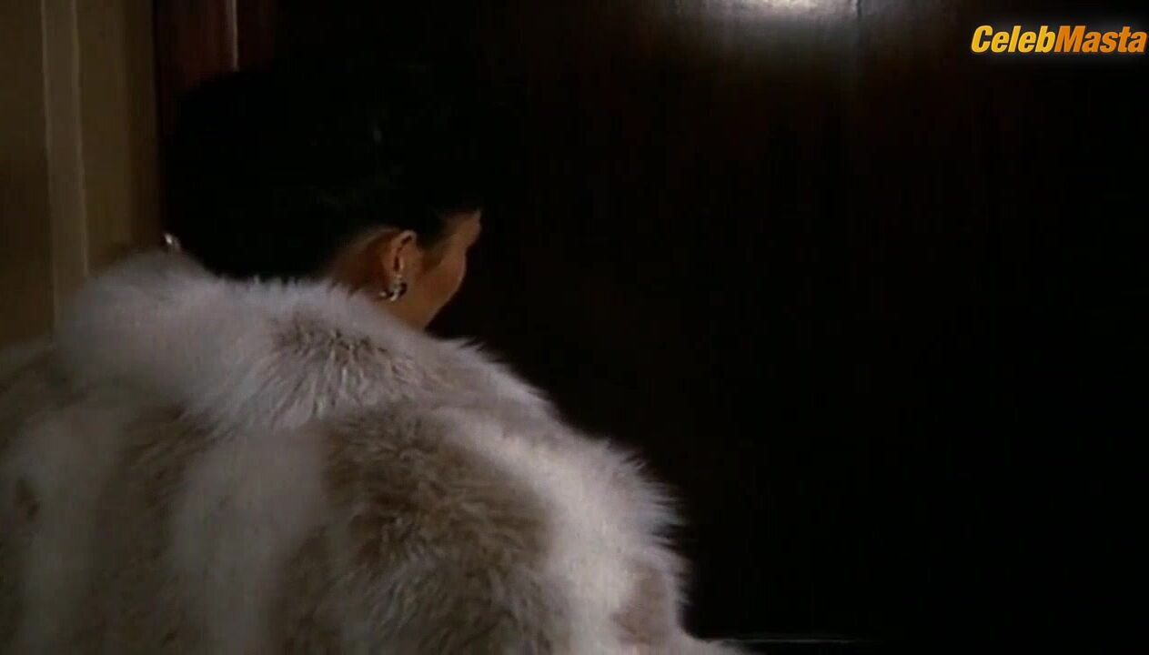 Tia Carrere Flaunts Booty Scene In Fine Gold - Photo 1 of 5