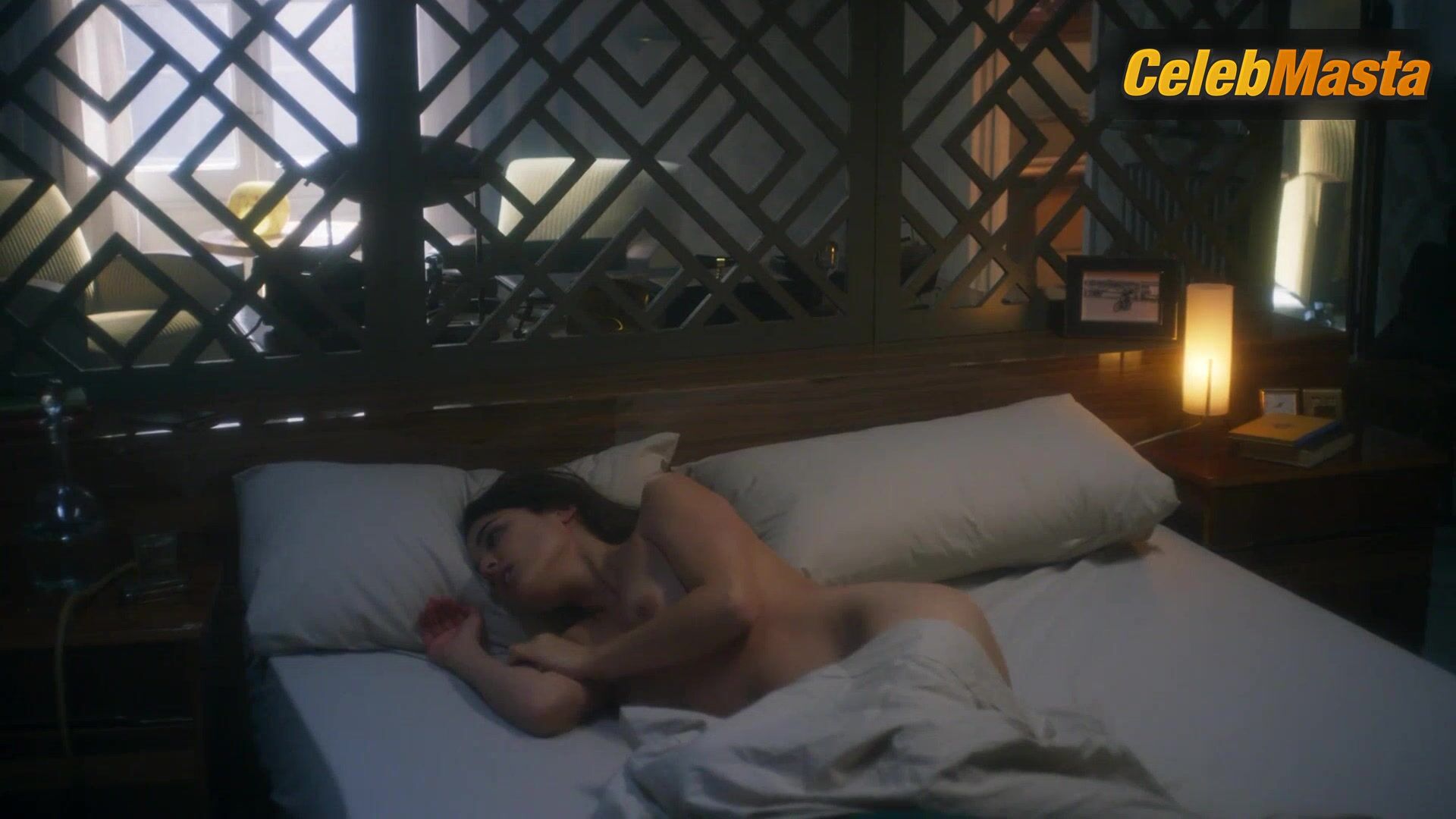 Adriana Ugarte Bares Breasts In Hache Scene - Photo 2 of 5 photo 1