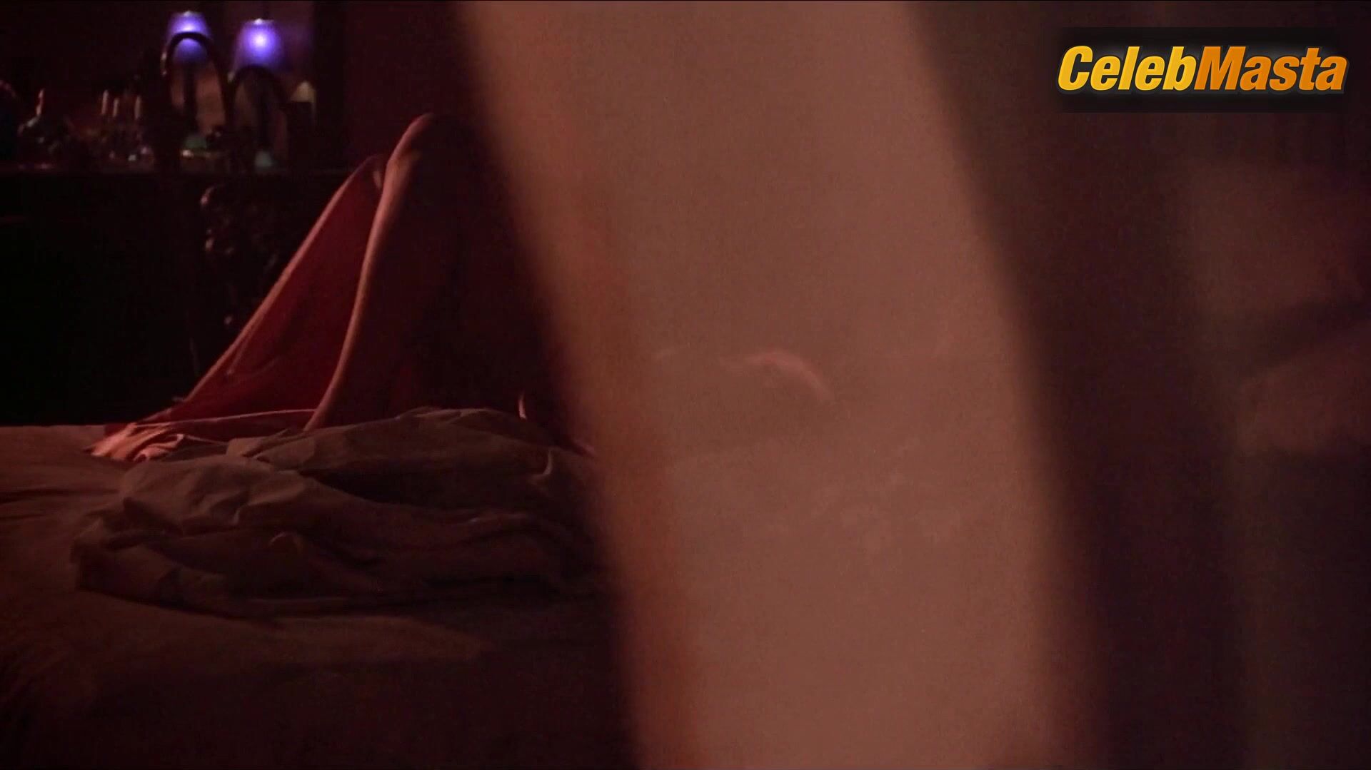 Lara Flynn Boyle ’s Sexy Scene From The Temp - Photo 1 of 5