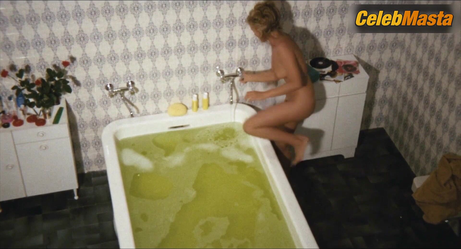 Ursula Andress Reveals Breasts, Butt Scene In Loaded Guns - Photo 2 of 5 photo 1