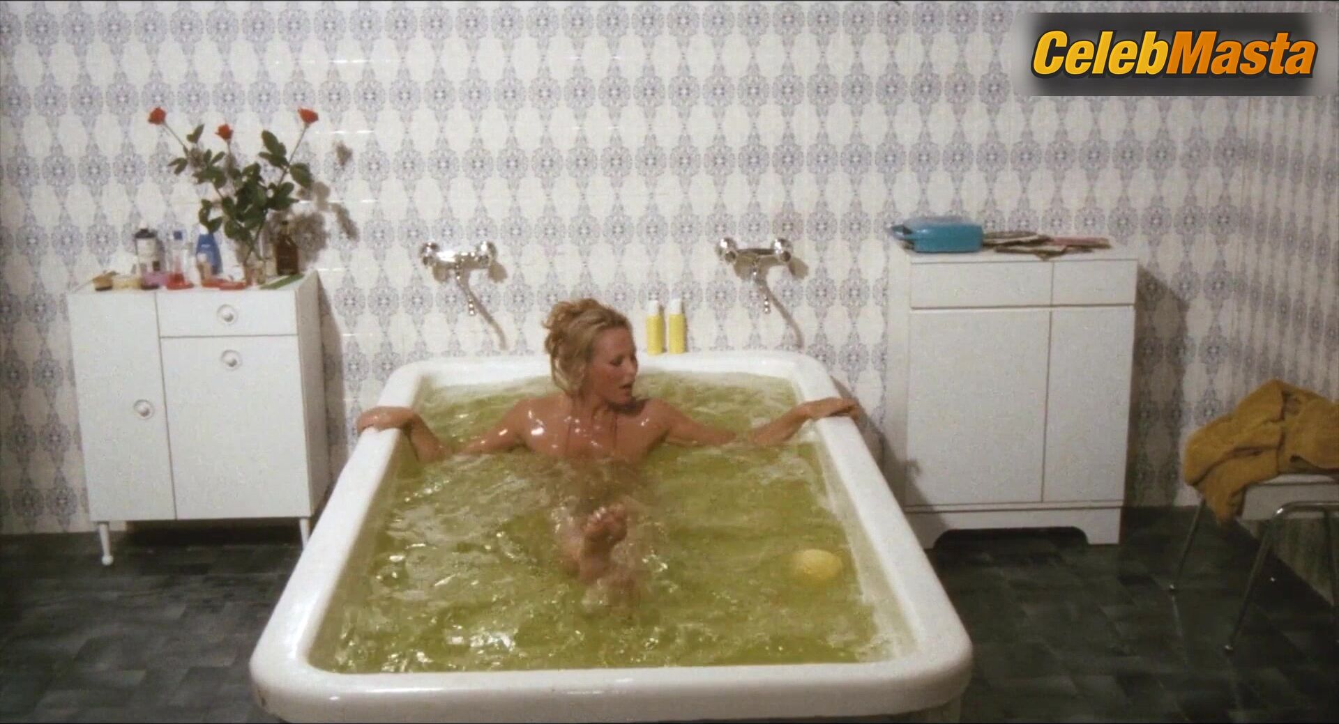 Ursula Andress Reveals Breasts, Butt Scene In Loaded Guns - Photo 2 of 5