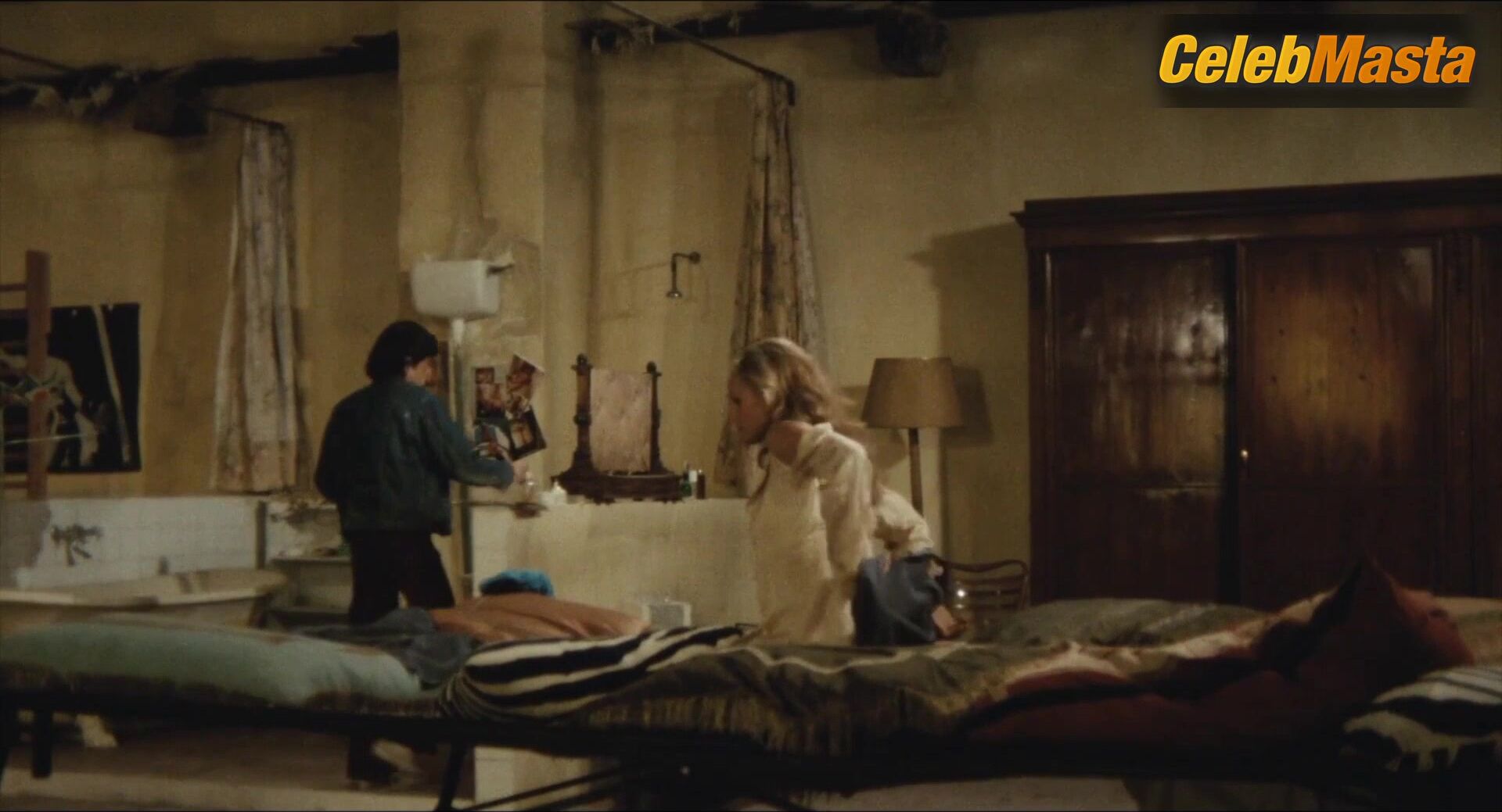 Ursula Andress Bares Butt, Underwear Scene In Loaded Guns - Photo 2 of 5 photo 1
